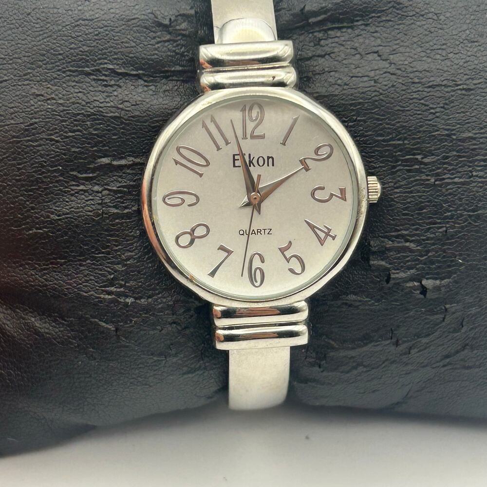 Eikon Silver-tone Exaggerated Hourly Numbers Women’s Bangle Watch Working